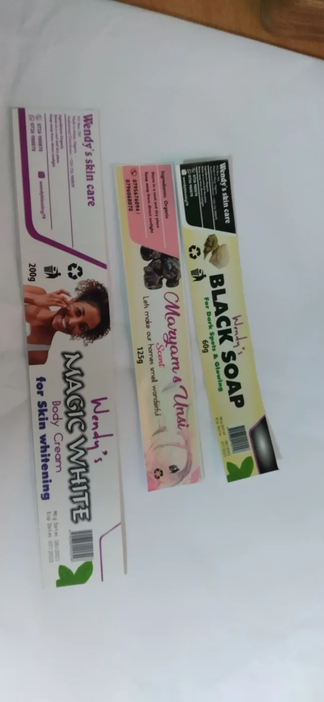 Printed cosmetic packaging labels laid out with ingredient and barcode panels
