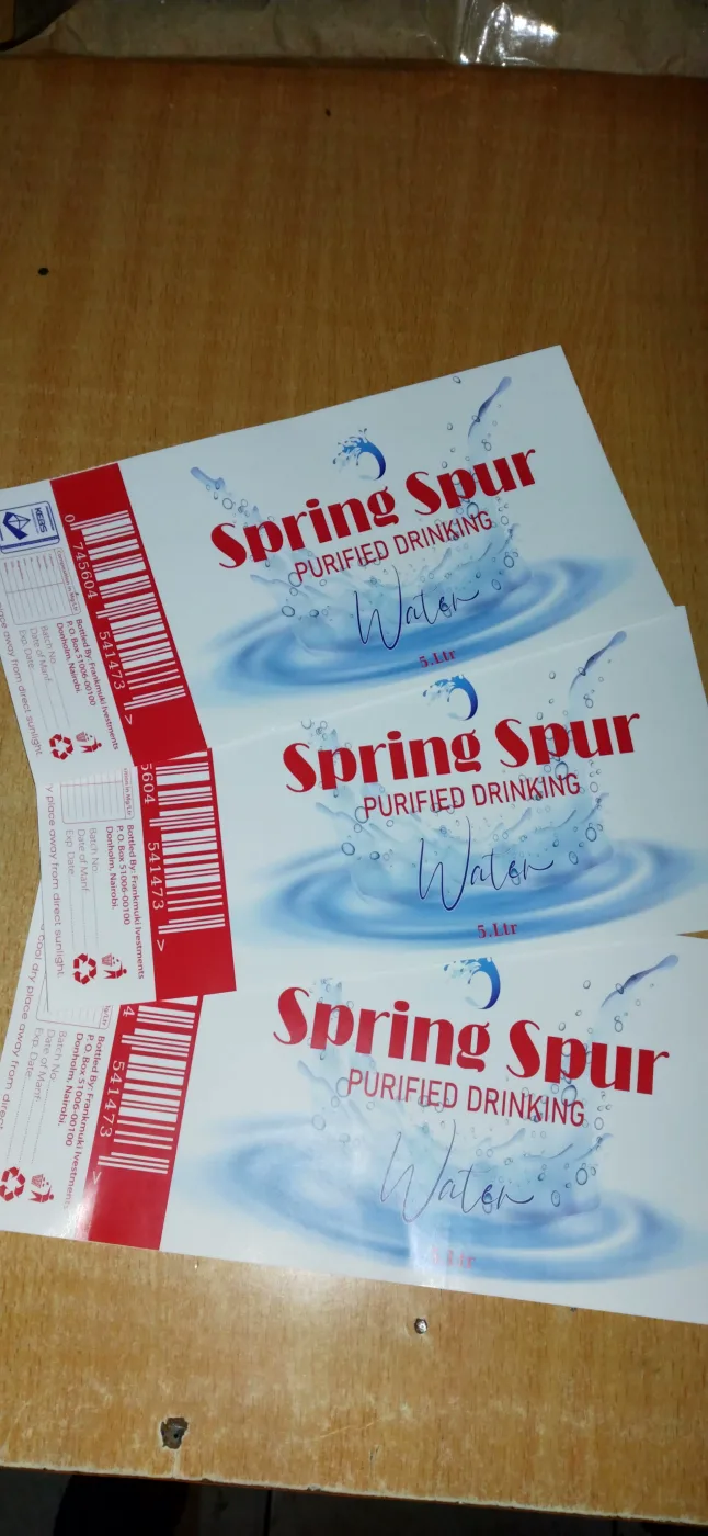 Printed drinking-water labels on the roll before application