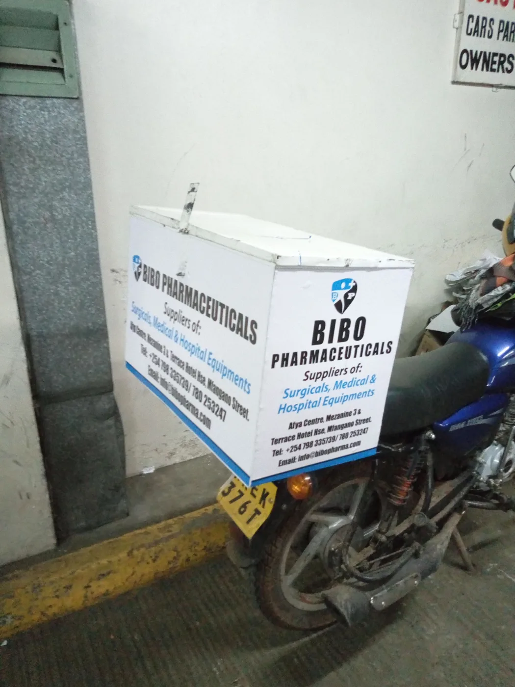 Branded delivery box fitted to a motorbike for a pharmaceutical distributor